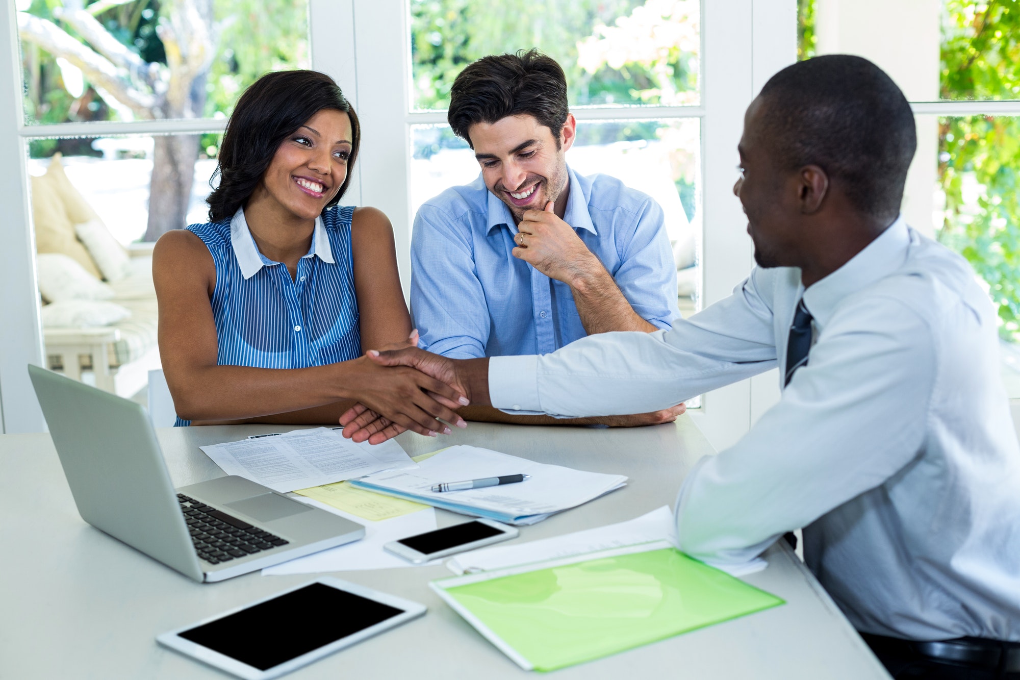 happy-couple-shaking-hands-with-real-estate-agent.jpg happy-couple-shaking-hands-with-real-estate-agent.jpg